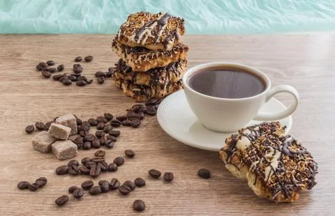 Cup of coffee with biscuits Stock Photos
