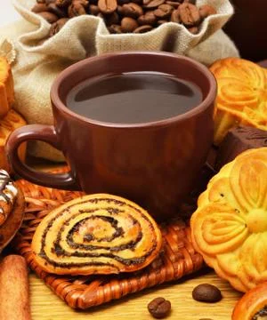 Cup of coffee with biscuits Stock Photos