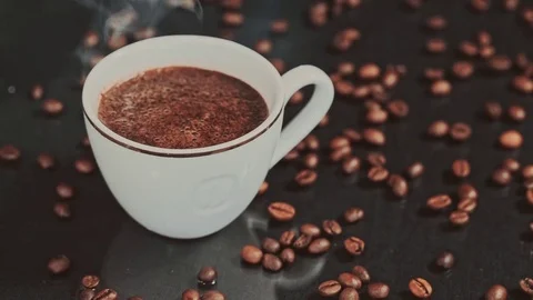 Cup of coffee on black background Stock Footage 73622305