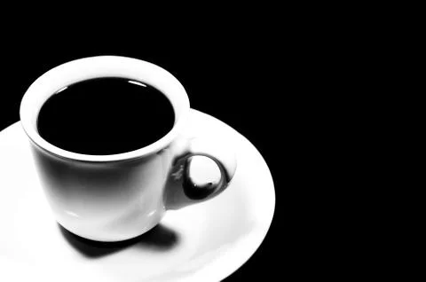 Cup of coffee on black background Stock Photos