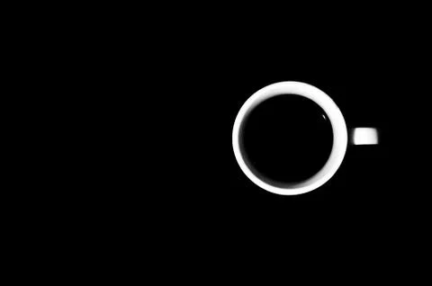 Cup of coffee on black background Stock Photos