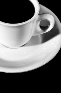 Cup of coffee on black background Stock Photos