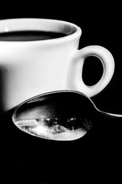 Cup of coffee on black background Stock Photos