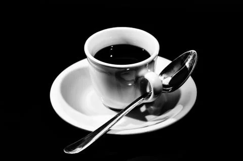 Cup of coffee on black background Stock Photos