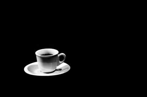 Cup of coffee on black background Stock Photos