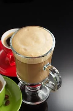 Cup of coffee on black Stock Photos