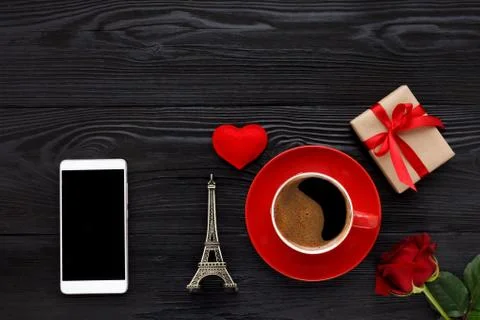 Cup of coffee on black table Stock Photos