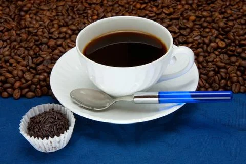 Cup of  coffee on a blue background Stock Photos
