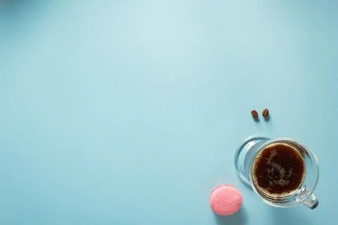 Cup of coffee at blue background Stock Photos
