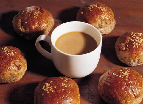 Cup of coffee with buns Stock Photos