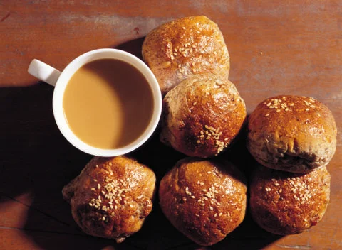 Cup of coffee with buns Stock Photos