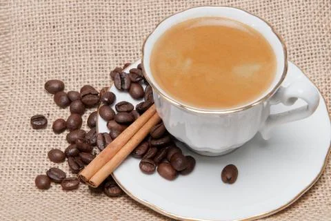Cup of coffee on a burlap. Stock Photos
