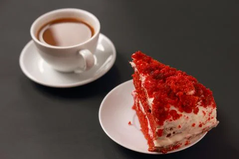 A cup of coffee with cake, an invigorating drink in the morning, home comfort. Stock Photos