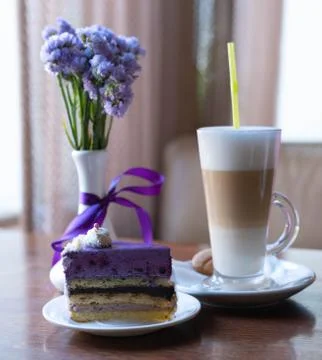 A cup of coffee with cake. White background. Morning coffee with milk. Tender Stock Photos