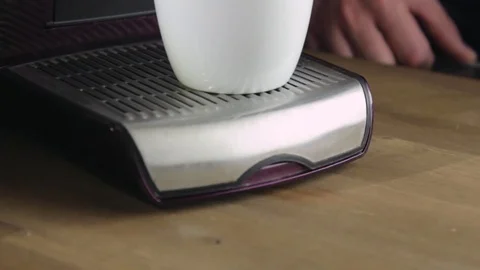 Cup of coffee from capsule coffee machine Stock Footage 70746214