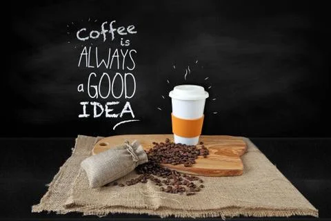 Cup of coffee on chalkboard background Stock Photos