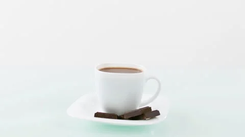 Cup of coffee with chocolate in studio Video stock 66343658
