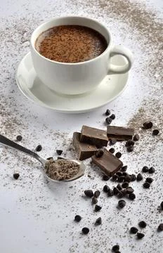 Cup of coffee with chocolate on a table Stock Photos