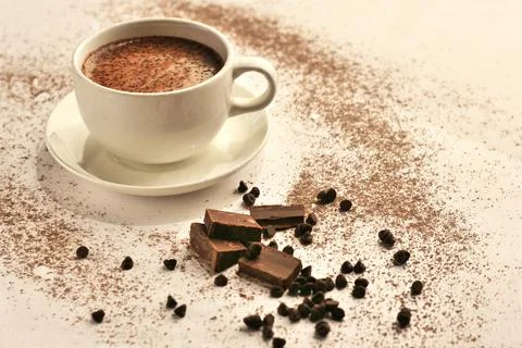Cup of coffee with chocolate on a table Stock Photos