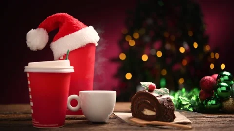 Cup of coffee with christmas decorations on old wooden table 库存影片 143244418
