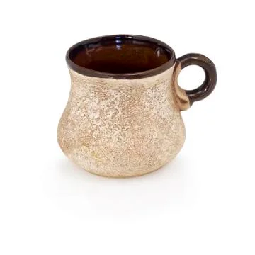 Cup coffee from clay made manually. Stock Photos