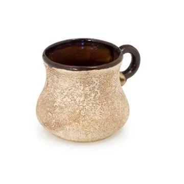 Cup coffee from clay made manually. Stock Photos