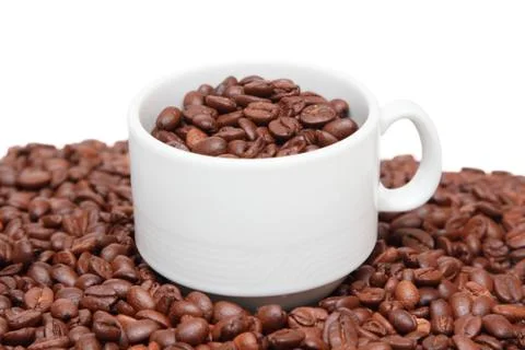 Cup of coffee with coffee bean inside Фото