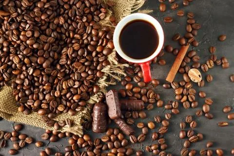 Cup coffee on a coffee beans background 스톡 사진