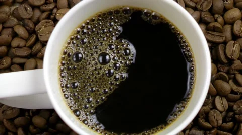 Cup of Coffee on Coffee Beans Stock Footage 68035745