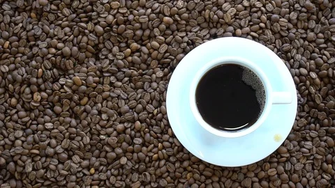 Cup Of Coffee On The Coffee Beans Stock Footage 96416072