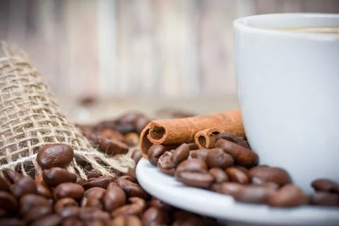 Cup of coffee with coffee beans Stock Photos