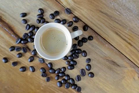Cup of coffee with coffee beans 写真素材