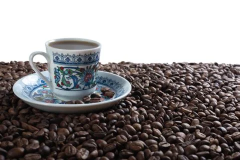 Cup on coffee on coffee beans Stock Photos