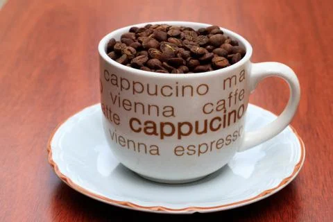Cup of coffee with coffee beans Foto stock