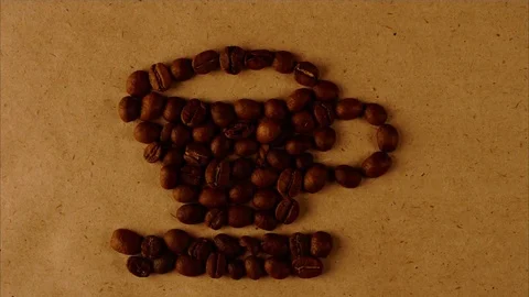 Cup of coffee from coffee beans stop motion Stock Footage