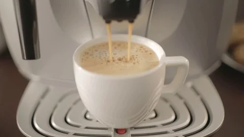 A cup of coffee in a coffee machine Stock Footage 77827815