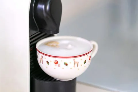 A cup of coffee in a coffee machine Stock Photos