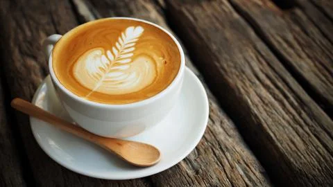 Cup of coffee in coffee shop vintage color Stock Photos