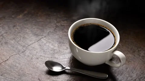 Cup of coffee with copy space on rustic background. Видео 141708812