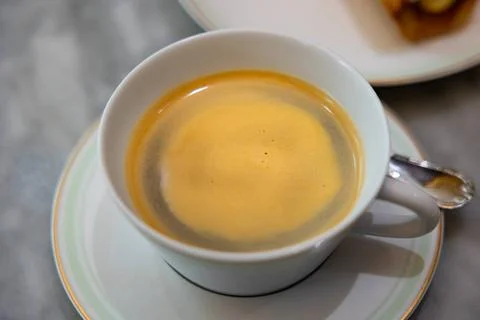  Cup of coffee. Cup of coffee on the table in the confectionery. Tasty bla... Stock-Fotos