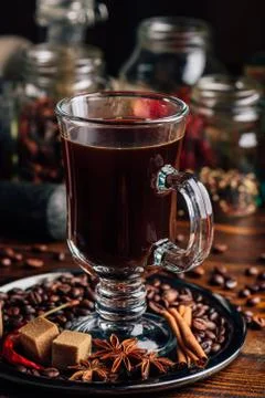 Cup of Coffee with Different Spices. Stock Photos