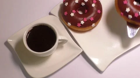 Cup of coffee with donut Stock Footage 58789366