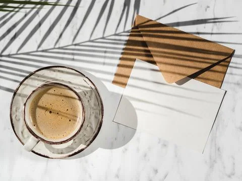 Cup coffee envelope top view. High quality beautiful photo concept Stock Photos