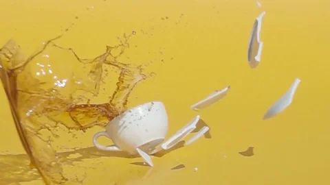 Cup of coffee falling and shattering Stock Footage 115699162