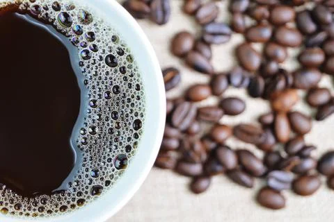 A cup of coffee with foam bubbles. Foto stock