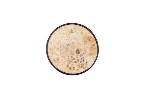 Cup of coffee with foam, latte. Object isolated on white background. Top view Stock Photos