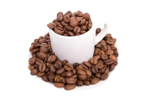 Cup of coffee, full of beans Stock Photos