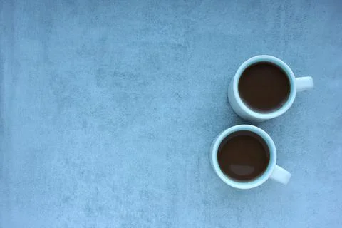 Cup of coffee on gray concrete background. Stock Photos