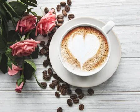A cup of coffee with heart pattern Stock Photos