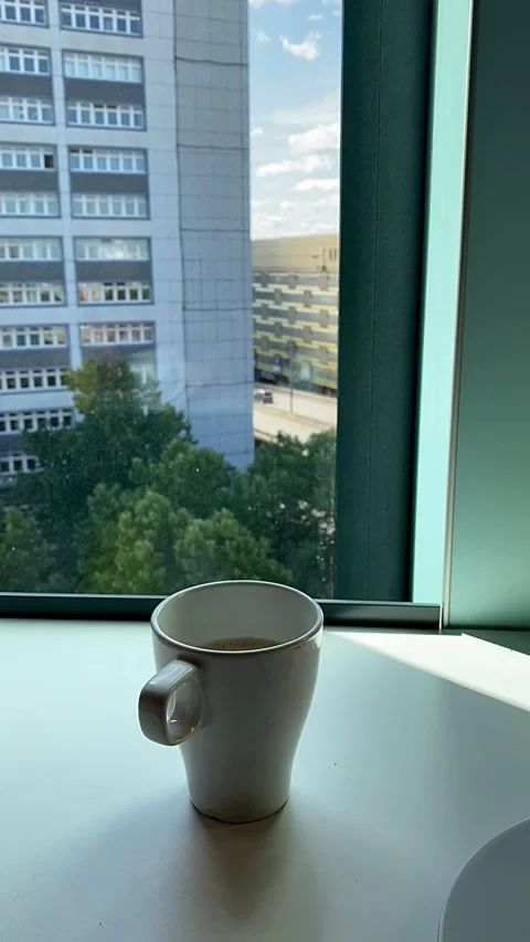 A cup of coffee on a high floor of a building in Bremen, Germany. Video stock 342002096
